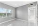 Bright bedroom with large window and tile floors at 2725 Terra Ceia Bay Blvd # 201, Palmetto, FL 34221