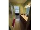 Bathroom featuring a shower, sink, and vanity area, leading into the bedroom for convenience at 10453 Westpark Preserve Blvd, Tampa, FL 33625