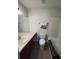 Bathroom featuring a toilet, sink, vanity, and a bathtub with shower at 10453 Westpark Preserve Blvd, Tampa, FL 33625
