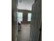View of neutral-toned bedroom featuring carpet, two windows, and space for comfortable living at 10453 Westpark Preserve Blvd, Tampa, FL 33625