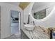 Bathroom with marble countertop and access to patio at 18482 Holly Ave, Port Charlotte, FL 33948