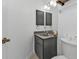 Bathroom with vanity, toilet and granite countertop at 18482 Holly Ave, Port Charlotte, FL 33948