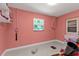Small bedroom with window and shelving at 18482 Holly Ave, Port Charlotte, FL 33948