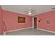 Simple bedroom with ceiling fan and window at 18482 Holly Ave, Port Charlotte, FL 33948