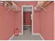 Shelved walk-in closet with tile floor at 18482 Holly Ave, Port Charlotte, FL 33948