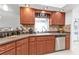 Kitchen with stainless steel appliances and wood cabinets at 18482 Holly Ave, Port Charlotte, FL 33948