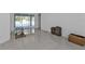 Open living space showcasing tile floors and pool view at 18482 Holly Ave, Port Charlotte, FL 33948