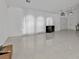 Spacious living room with large windows and tile flooring at 18482 Holly Ave, Port Charlotte, FL 33948