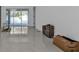 Bright and spacious living room with large windows and tile floors at 18482 Holly Ave, Port Charlotte, FL 33948