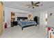 Spacious main bedroom with a king-size bed, and plenty of light at 18482 Holly Ave, Port Charlotte, FL 33948