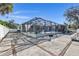 Screened-in pool area with a patio and basketball court at 18482 Holly Ave, Port Charlotte, FL 33948