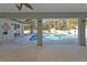 Covered patio overlooking refreshing pool at 18482 Holly Ave, Port Charlotte, FL 33948