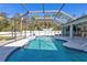 Inviting screened pool with a spacious deck at 18482 Holly Ave, Port Charlotte, FL 33948