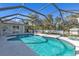 Relaxing screened pool area, perfect for summer at 18482 Holly Ave, Port Charlotte, FL 33948