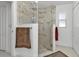 Luxurious shower with marble tile and glass enclosure at 18482 Holly Ave, Port Charlotte, FL 33948
