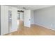 Bedroom features wood floors, ceiling fan and closet with mirrored doors at 1801 40Th N St, St Petersburg, FL 33713
