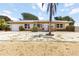Charming single-story home featuring a front lawn and a concrete driveway at 1801 40Th N St, St Petersburg, FL 33713