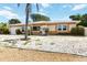 Charming single-story home featuring a front lawn and a concrete driveway at 1801 40Th N St, St Petersburg, FL 33713