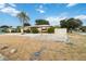 Charming single-story home with a well-kept lawn, featuring a privacy fence and awning-covered windows at 1801 40Th N St, St Petersburg, FL 33713