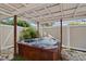 Outdoor hot tub beneath a covered patio, perfect for relaxation and privacy at 1801 40Th N St, St Petersburg, FL 33713