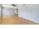 Spacious living room showcasing hardwood floors, neutral gray walls, and ample space for furniture arrangement at 1801 40Th N St, St Petersburg, FL 33713