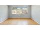 Bright room with view to the outdoors and wood laminate flooring at 1801 40Th N St, St Petersburg, FL 33713