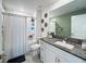 Bathroom featuring granite counters, stainless steel hardware, and a shower/tub combo at 12764 Weston Oaks Ln, Riverview, FL 33579