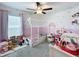 Adorable ' bedroom with a decorative house-shaped bed frame at 12764 Weston Oaks Ln, Riverview, FL 33579