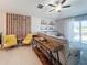 Inviting living room with modern decor, comfortable seating, and sliding glass doors leading to the backyard at 12764 Weston Oaks Ln, Riverview, FL 33579