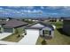 Single-Gathering home with solar panels, two-car garage, and landscaped yard at 12764 Weston Oaks Ln, Riverview, FL 33579