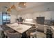 Modern kitchen with stainless steel appliances and large island at 5735 Shorebird Br, Land O Lakes, FL 34638