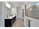 Double vanity bathroom with a large walk in shower at 5735 Shorebird Br, Land O Lakes, FL 34638