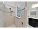 Large walk in shower with glass enclosure and neutral tile at 5735 Shorebird Br, Land O Lakes, FL 34638