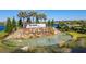 Del Webb community entrance with a scenic fountain and pond at 5735 Shorebird Br, Land O Lakes, FL 34638