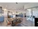 Open concept kitchen and dining area with modern finishes and backyard access at 5735 Shorebird Br, Land O Lakes, FL 34638