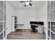 Home office with built-in shelving and ample workspace at 5735 Shorebird Br, Land O Lakes, FL 34638