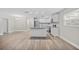 Modern kitchen boasts stainless steel appliances and an island with granite countertops at 304 W Fern St, Tampa, FL 33604