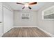Well-lit bedroom with double closets and vinyl flooring at 304 W Fern St, Tampa, FL 33604