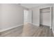 Spacious bedroom with wood-look floors and ample closet space at 304 W Fern St, Tampa, FL 33604