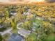 Aerial view of house and surrounding neighborhood at sunset at 304 W Fern St, Tampa, FL 33604