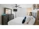 Main bedroom with king-size bed and dresser with ocean view at 20000 Gulf Blvd # 707, Indian Shores, FL 33785