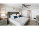 Main bedroom with king-size bed and en-suite bathroom access at 20000 Gulf Blvd # 707, Indian Shores, FL 33785