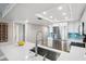 White quartz countertop kitchen island with a stainless steel sink at 20000 Gulf Blvd # 707, Indian Shores, FL 33785