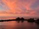 Peaceful sunset over the water with a beautiful sky at 5915 Sea Ranch Dr # 410, Hudson, FL 34667