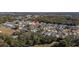 Wide aerial view showing home's location in a quiet neighborhood at 5846 Greenbriar Ct, Zephyrhills, FL 33542