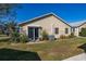 Spacious backyard with patio and ample green space at 5846 Greenbriar Ct, Zephyrhills, FL 33542