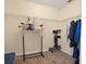 Walk-in closet with ample shelving and hanging space at 5846 Greenbriar Ct, Zephyrhills, FL 33542