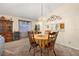 Dining room with wooden table, chairs, and hutch at 5846 Greenbriar Ct, Zephyrhills, FL 33542