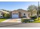 Charming single-story home featuring a brick-accented garage and well-maintained landscaping at 5846 Greenbriar Ct, Zephyrhills, FL 33542