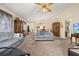 Spacious living room with plush sofas and carpeting at 5846 Greenbriar Ct, Zephyrhills, FL 33542